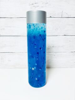Super Easy DIY Rainbow Rice I Spy Sensory Bottle - The Mindful Toddler
