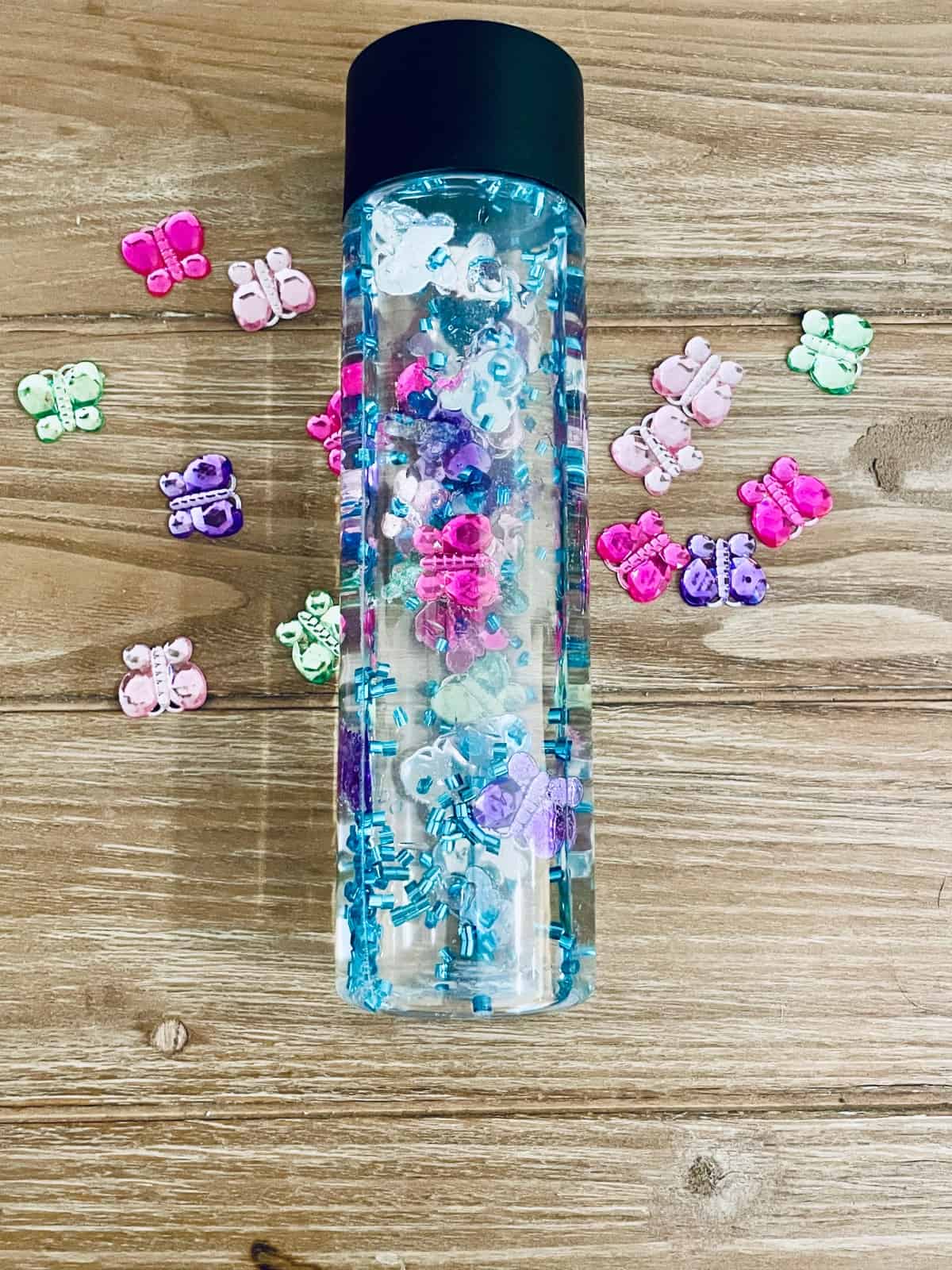DIY Butterfly Sensory Bottle: Spring Sensory Bottle Idea for Toddlers ...