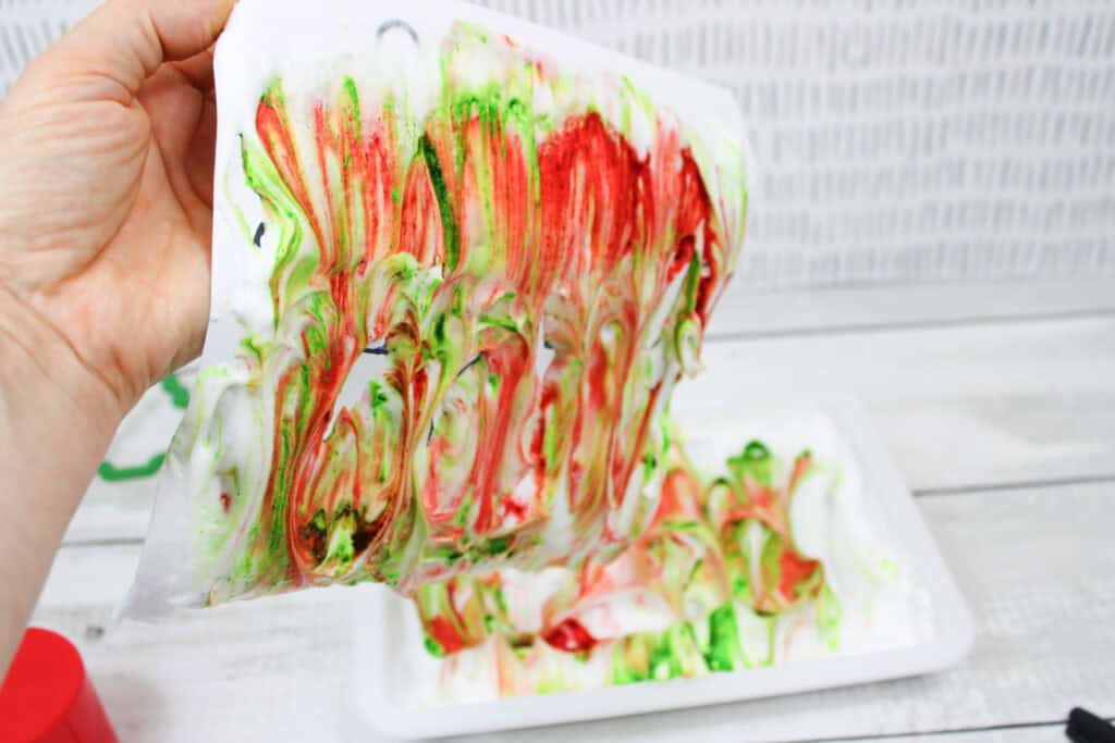 taking the paper off the shaving cream