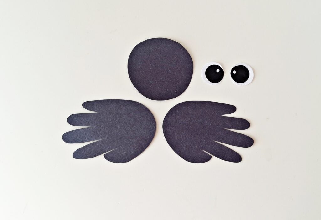 Handprint Spider Steps (8)
Carefully cut out both handprints. For younger kids, an adult can help here.
